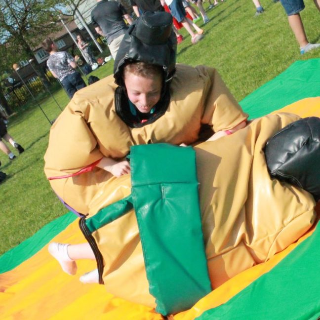 green sumo suit